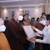 胡志明市表彰支持抗疫一线医务人员任务的宗教志愿者