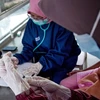 印尼单日新冠肺炎确诊病例数增长70% 