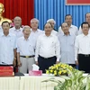 阮春福向安江省原领导拜年 出席大米加工厂落成典礼