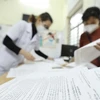 越南4月13日报告新冠肺炎新增确诊病例24623例 制定两种防疫预案