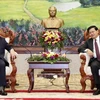老挝党和国家领导人会见越共中央宣教部代表团