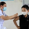越南全国新增报告1550例 1400万人持有疫苗护照