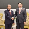 越南国会主席王廷惠会见老挝技术和通信部部长兼老越友好协会主席