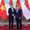 越南政府总理范明政会见新加坡国会议长陈川仁