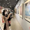 胡志明市首次举行丝绸画展