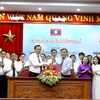 越南广平省和老挝沙湾拿吉省签署合作备忘录