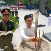 政府常务副总理范平明在河江省渭川国家烈士陵园向英雄烈士们上香