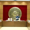 国会主席王廷惠主持修改城市和行政单位分类决议的会议