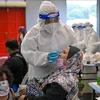 马来西亚提出应对奥密克戎变异株感染病例数增加的措施