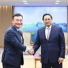 越南政府总理范明政会见三星电子公司总裁卢泰文