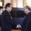 越南国家主席阮春福出席日本前首相安倍晋三丧事答谢活动