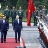 越南政府总理范明政举行仪式 欢迎德国总理对越南进行正式访问