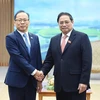 越南政府总理范明政会见离任前来拜会的柬埔寨驻越大使查伊