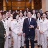 越南国会主席王廷惠会见女性人民公安代表