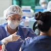泰国开展新冠疫苗加强针接种工作 印尼将保持新冠疫情紧急状态