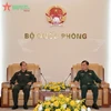 黄春战上将会见老挝化学局代表团