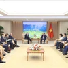 越南政府总理范明政会见奥地利外长