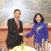 越南与老挝加强民运工作经验交流