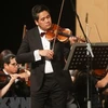 才华横溢的小提琴家裴公维被授予国际名誉教授称号