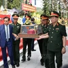 河静省为在老挝牺牲的10名烈士举行追悼会