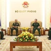 越南国防部副部长武海产上将会见老挝人民军后勤总局主任坎佩·西索尼