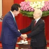 越共中央总书记阮富仲会见韩国总统尹锡悦