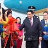 越南政府总理范明政抵达北京开始对中国进行正式访问并出席世界经济论坛年会