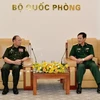武海产上将会见老挝国防部财政局局长