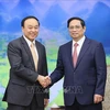 越南政府总理范明政会见老挝卫生部长本风·福马来西特