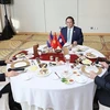 越南政府总理范明政与老挝总理和柬埔寨首相共进工作早餐