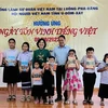 旅居老挝越南人响应越南语日