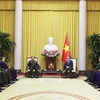 越南国家主席武文赏会见老挝国防部副部长通莱•西力冯