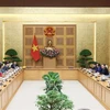 越南政府总理范明政会见联合国常驻越南协调员及部分联合国驻越代表机构首席代表