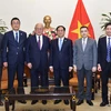 越南外交部长裴青山会见日越友好议员联盟顾问武部勤