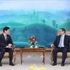 范明政总理会见日本经济贸易与工业产业大臣西村康稔