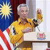 新加坡总理李显龙宣布下届大选前交棒给副总理黄循财
