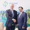 范明政总理主持题为“动员资金兑现越南对气候变化的承诺”活动