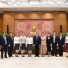 越南国会副主席阮德海会见老挝万象市人民议会代表团