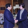 政府总理范明政探访日本已故首相安倍晋三家属