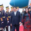 越南政府总理范明政抵达首都布加勒斯特 开始对罗马尼亚进行正式访问