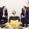 越南政府副总理黎明慨会见美国驻越大使马克·纳珀