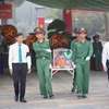 越共中央宣教部部长阮重义出席烈士遗骸追悼会和安葬仪式