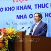 越南政府总理范明政主持召开消除困难 促进保障性住房发展会议