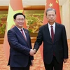 越南国会主席王廷惠与中国全国人大常委会委员长赵乐际举行会谈并签署合作协议 
