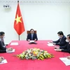 越南政府总理范明政同中国国务院总理李克强通电话
