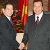 阮明哲主席接见老挝主席办公厅主任Phongsavath Boupha