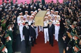 Party General Secretary Nguyen Phu Trong's casket leaves National Funeral Hall (Photo: VNA)