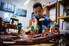 Young artisan tells folk tales with rice flour figurines