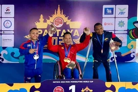 Le Van Cong of Vietnam (centre) and the two runners-up in the men's 49kg at the Pattaya World Cup 2024 in Thailand on May 8. (Photo courtesy of SAV)