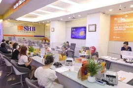 A transaction office of the Saigon - Hanoi Commercial Joint Stock Bank (SHB) (Photo: VNA)